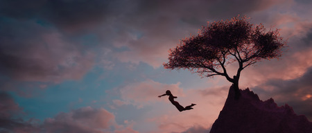 3d illustration of a woman jumping from a mountainの写真素材