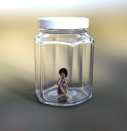 woman locked in a glass jarの写真素材
