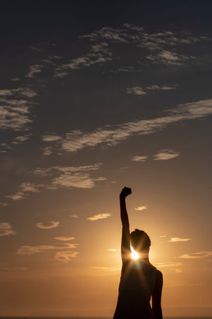 woman and sunset on the beach