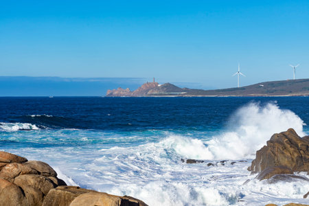 coast of galicia, lighthouse and wind generators