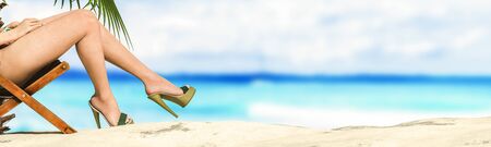 3d illustration, woman sunbathing on a sunbedの写真素材