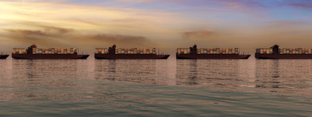 The silhouettes of cargo ships adorned with containers are arrayed on calm waters as dusk settles in