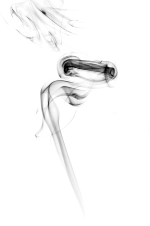 Abstract black smoke isolated on white backgroundの写真素材