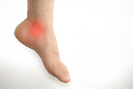 Man with foot pain and copyspaceの写真素材