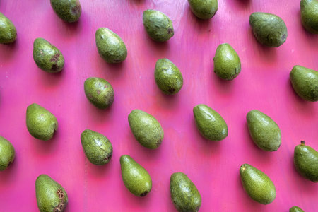 A Avocados texture with pink vintage background