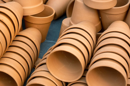 A stack of unpainted clay potsの写真素材