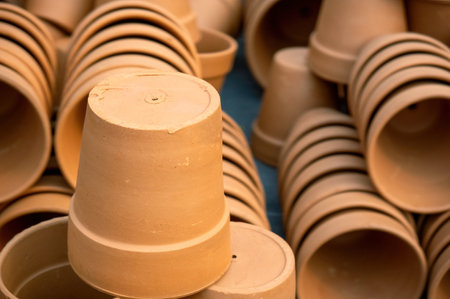 A stack of unpainted clay potsの写真素材