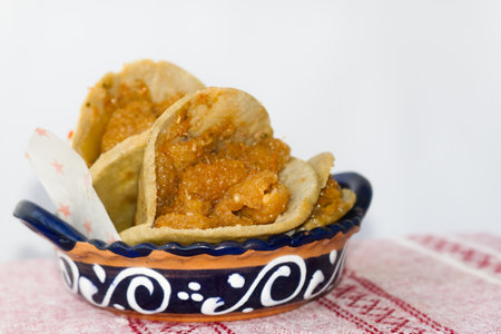 A Mexican gorditas de migajas with pork rinds and chileの写真素材