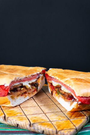 A Mexican Torta Caprichosa Grande with Milanese pork, leg ham and cheeseの写真素材