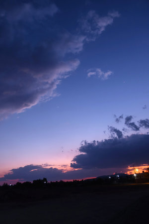 A blue sky with a few clouds in itの写真素材