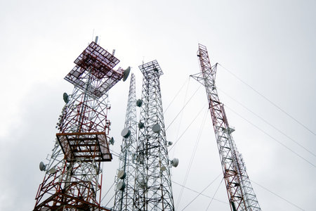 Explore transmission stations, antennas, and power lines connecting the modern landscape. Immerse...