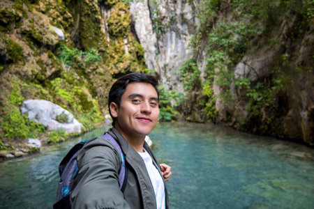 Embark on an unforgettable journey to Grutas Tolantongo, where a lush landscape of rivers, waterfalls, and serene forests beckon travelers seeking adventure and tranquilityの写真素材