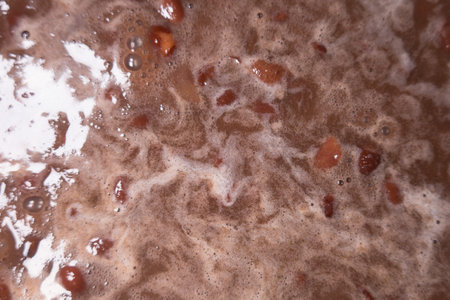 A Background texture of boiling beans in Mexican cuisine