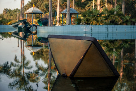 Slides and pool in abandoned water park, Ho Thuy Tien Lake, Hue Vietnam