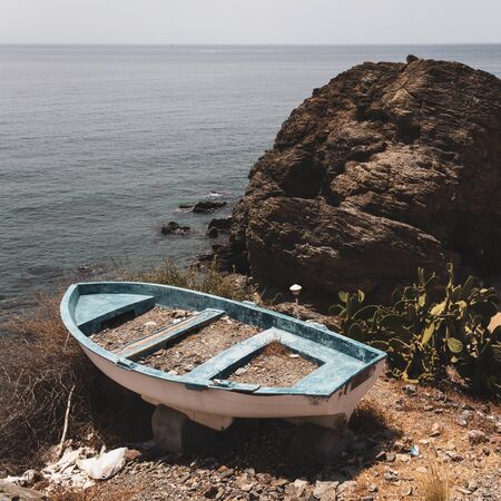 Old abandoned boat on PeÃ±Ã³n de San Patricio in MÃ¡laga, Spainの写真素材