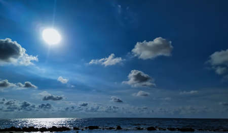 Radiant Caribbean sun illuminating the blue waters of the sea (Cartagena de Indias).の写真素材