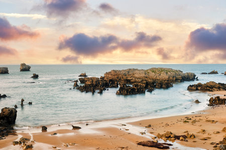 Golden beach at sunset Ris, Noja, Cantabria, Spainの写真素材