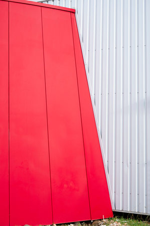 Red and white detail of metal architecture facadeの写真素材
