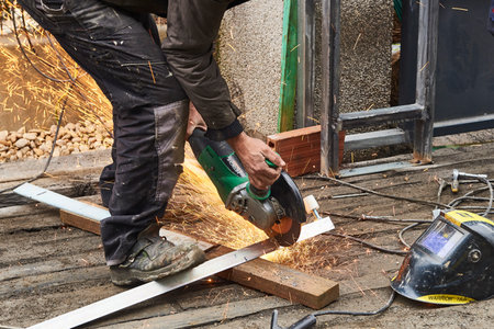 Worker with a grindin machineのeditorial素材