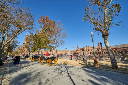 Carriage in the Plaza de EspaÃ±a, Seville, built for the Ibero-American Exposition of 1929, Seville, Andalusia, Spain, Europe.のeditorial素材