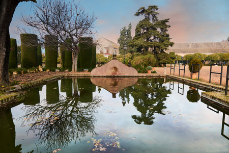 Pond in the gardens of Alcazar de los Reyes Cristianos, Fortress of the Christian Kings, Cordoba, Spain. Gardens of Alcazar de los Reyes Cristianos, Fortress of the Christian Kings, Cordoba, Spain.のeditorial素材
