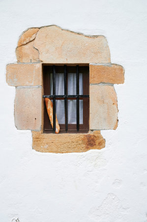 Vintage window with piece of bread