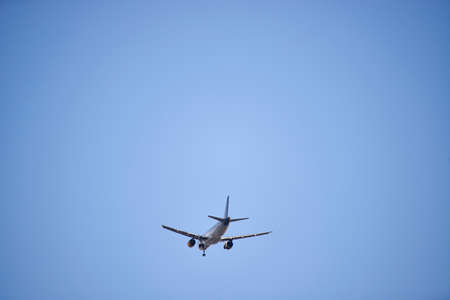Commercial aircraft in final approach to the airport of Bilbao, Biscay, Basque Country, Euskadi, Spain, Europeの写真素材