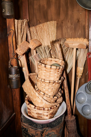 Wicker baskets and rustic wood and wicker brooms typical of the Basque Country
