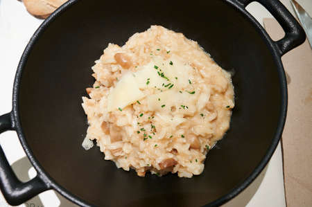 delicious risotto dish served in a wokの写真素材