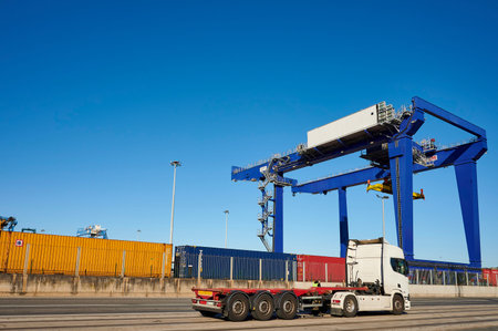 Container truck in the port of Bilbao with containers and crane in the background, Santurce, Biscay,...
