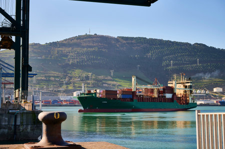 Container ship entering the Santurce terminal of the port of Bilbao, Santurce, Biscay, Basque...