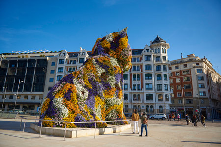 03-22-2018, Puppy sculpture by Jeff Koons at the Guggenheim Museum Bilbao is a museum of modern and contemporary art, designed by Canadian-American architect Frank Gehry , and located in Bilbao, Basque Country, Spain.のeditorial素材