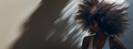 Young woman with afro hair with copyspace background. Generative AI.の素材