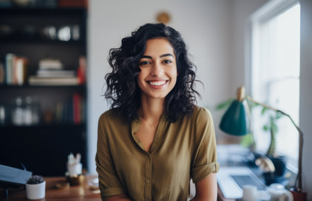 Smiling diverse businesswoman at her homeの素材