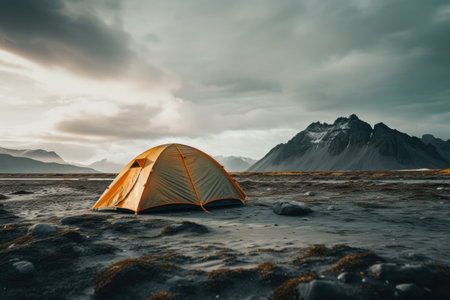 Lone tent in a beautiful landscape. Concept image on travel, nomad life and sustainable holidays.の素材