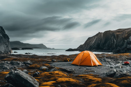 Lone tent in a beautiful landscape. Concept image on travel, nomad life and sustainable holidays.の素材