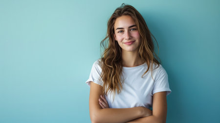Young woman posing in front of clean background.Copyspace for text.の素材