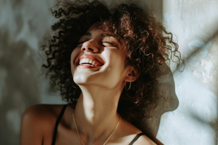 Portrait of a carefree young woman enjoying her dayの素材