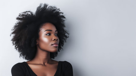 Confident African American young entrepreneur woman isolated on a white background with space for textの素材