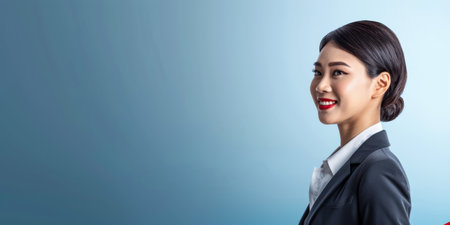 Young Asian businesswoman portrait with copy space for text backgroundの素材