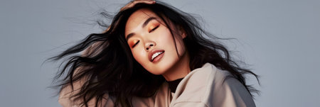 Fashion model portrait of an Asian woman with natural makeupの素材