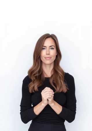 Portrait of a happy young woman isolated from a white background copy space for text.の素材