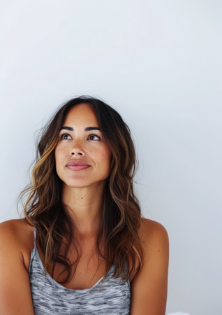 Portrait of a beautiful diverse woman isolated on a white copy space background for text.の素材