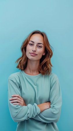 Portrait of a smiling young woman looking at the camera with a copy space backgroundの素材