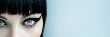 Portrait of a young albino model with a bold cat eyeliner and ample copy spaceの素材