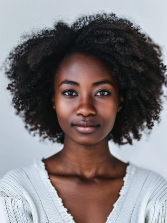 Diverse African woman portrait with a clean background for textの素材
