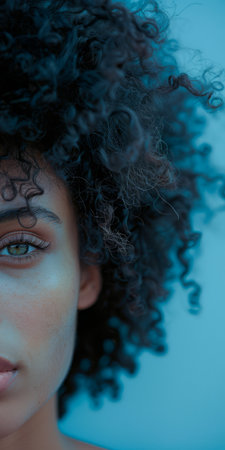 Beauty portrait of the serene elegance of a young diverse woman isolated from the backgroundの素材