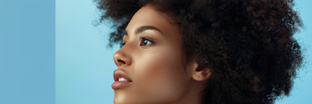 Beauty portrait of the serene elegance of a young diverse woman isolated from the backgroundの素材