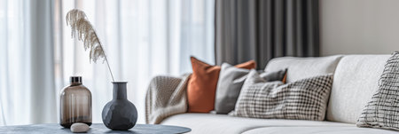 Elegant and modern living room interior with cozy decor elementsの素材