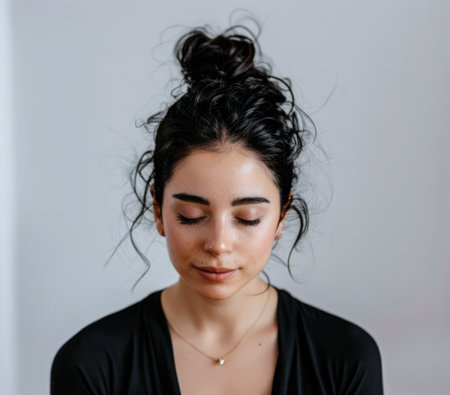 Serene yoga woman in meditation poseの素材